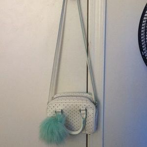 Teal Justice purse.